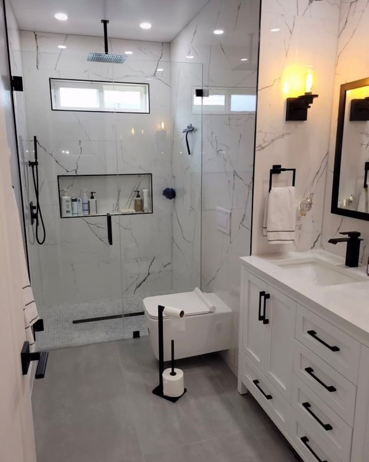 Modern bathroom remodeling project with glass shower